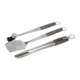 Silver brush, spatula, and tongs