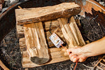 Fire starter on logs 