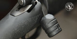 closeup of gray rifle bolt