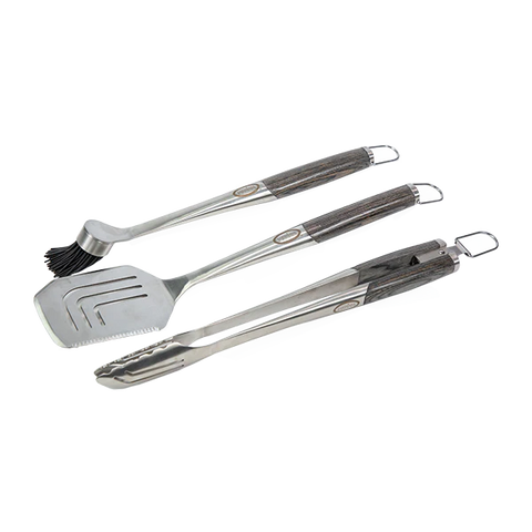 Silver brush, spatula, and tongs