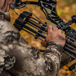 Apex gear reactor xl quiver in man's hand with bow